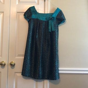 I love this dress it is so soft. Satin material.